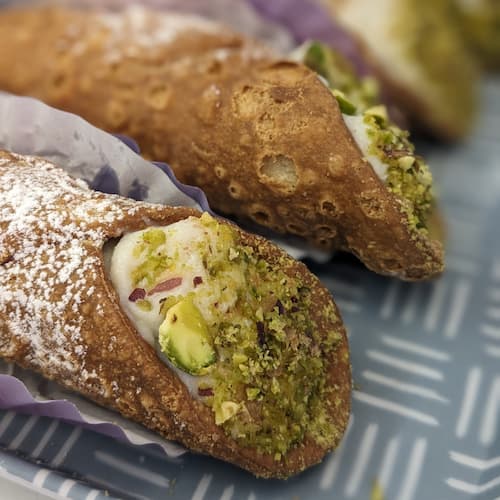 Closeup photo of pistachio cannoli