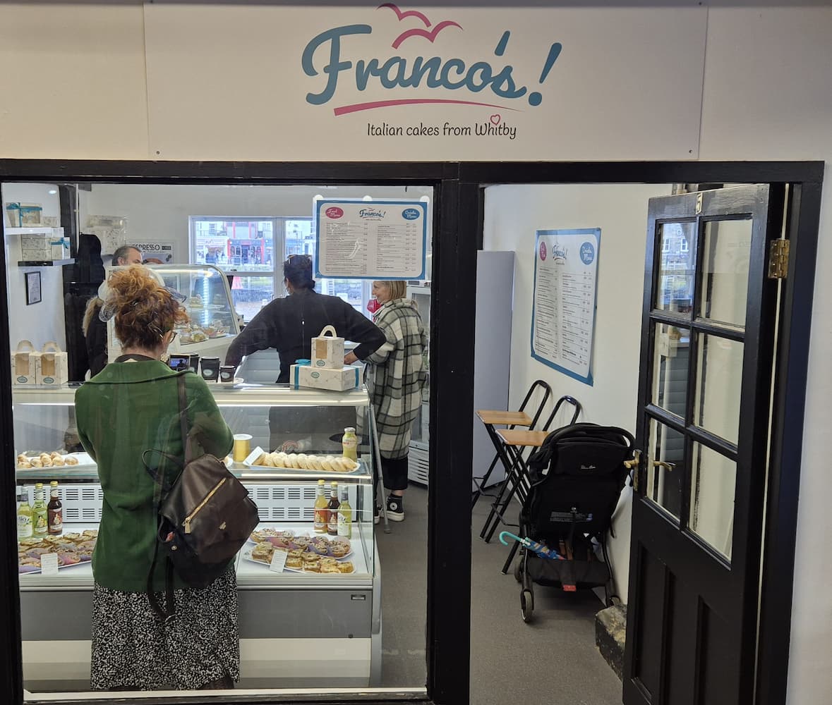 Wide photo of the shopfront of Franco's in Whitby